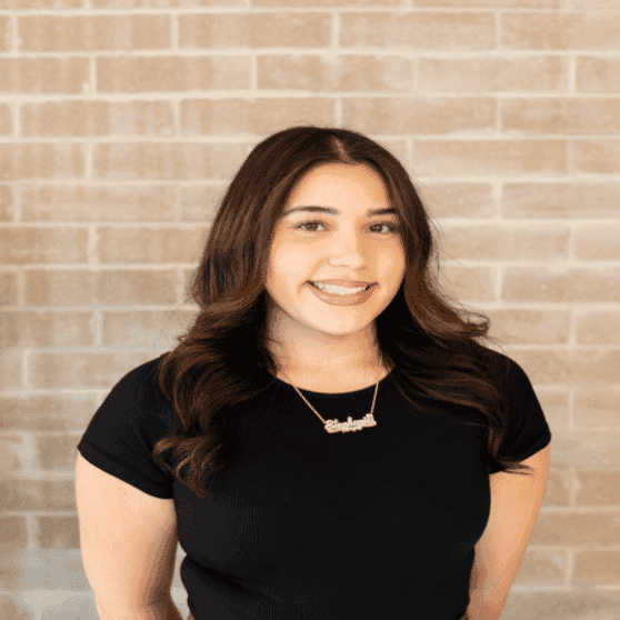 Portrait of Stephanie, a professional stylist at Salon JaDor, showcasing their expertise and style.