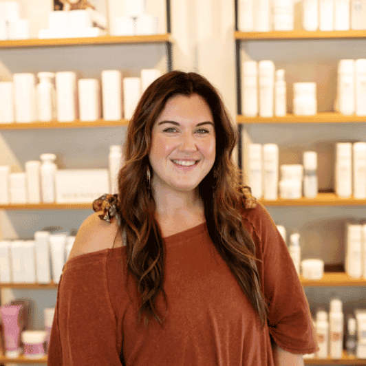 Portrait of Rachel, a professional stylist at Salon JaDor, showcasing their expertise and style.