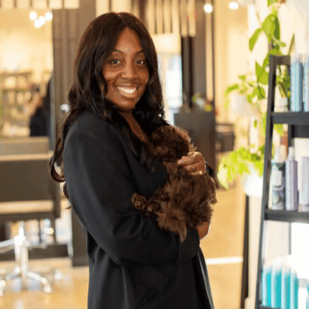 Portrait of Natalie, a professional stylist at Salon JaDor, showcasing their expertise and style.